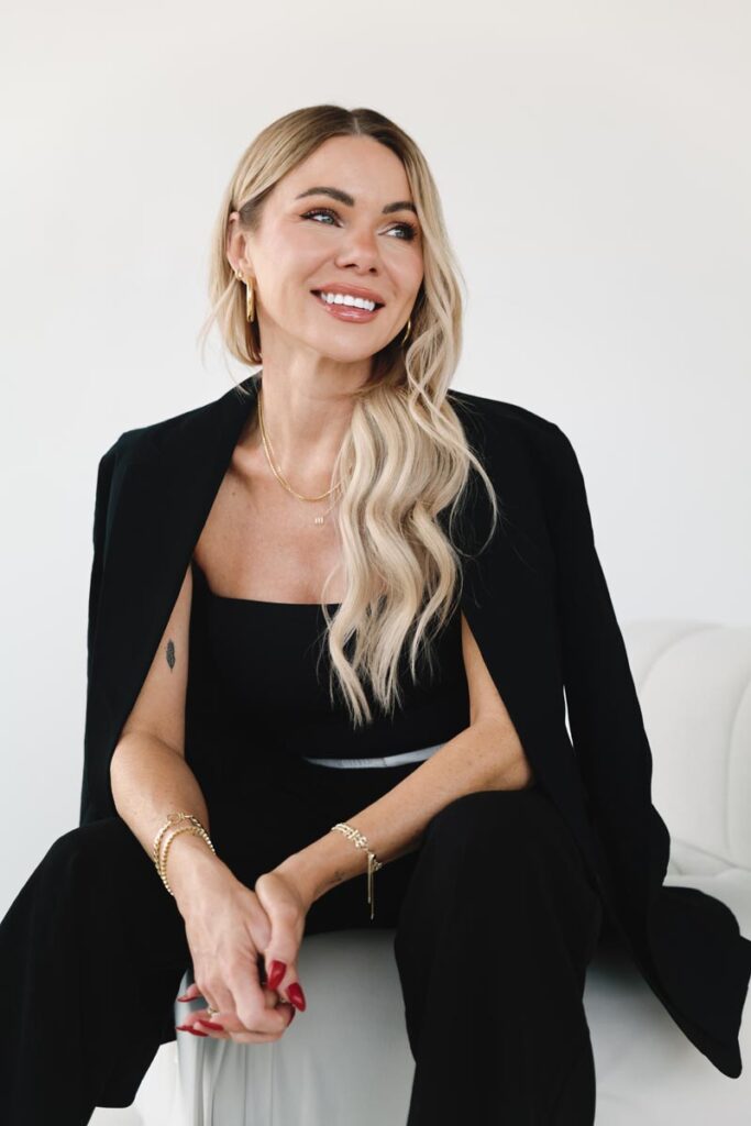 Professional headshot of a hairstylist from a Minnesota salon, taken by a branding photographer near me.