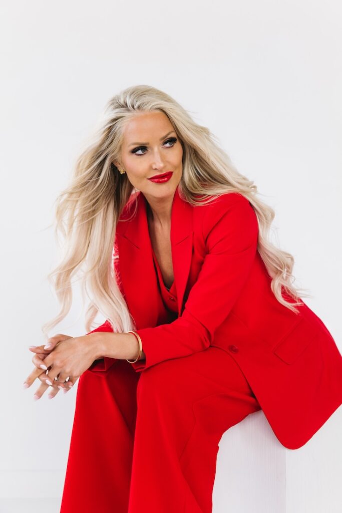Confident branding image of a mortgage lender wearing red, captured by a Fargo photographer.